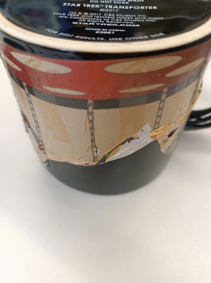 The outside of the mug is warped because of the heat of the dishwasher