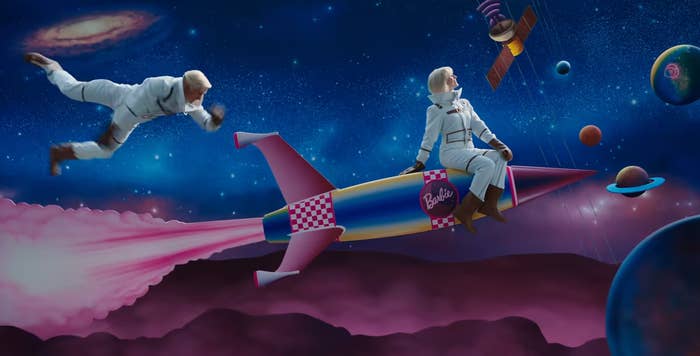 Barbie sitting atop a rocket