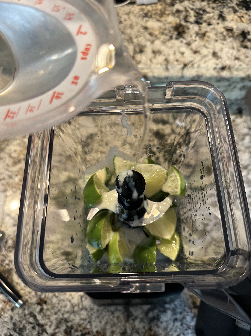 water being poured into a blender