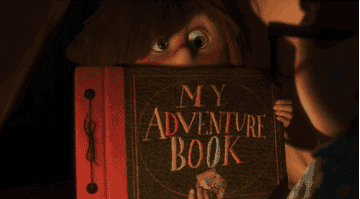 GIF of a little girl showing her &quot;adventure book&quot;