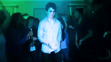 A teenager dances around at a house party