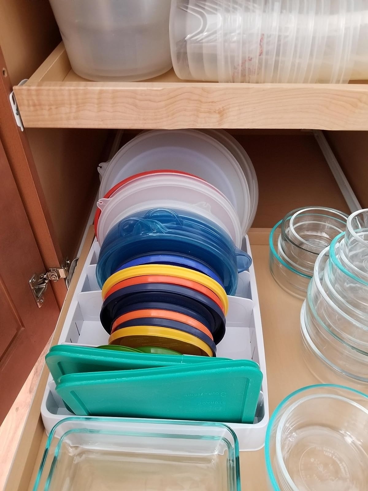 the lid organizer with green rectangle-shaped and blue round-shaped plastic lid containers