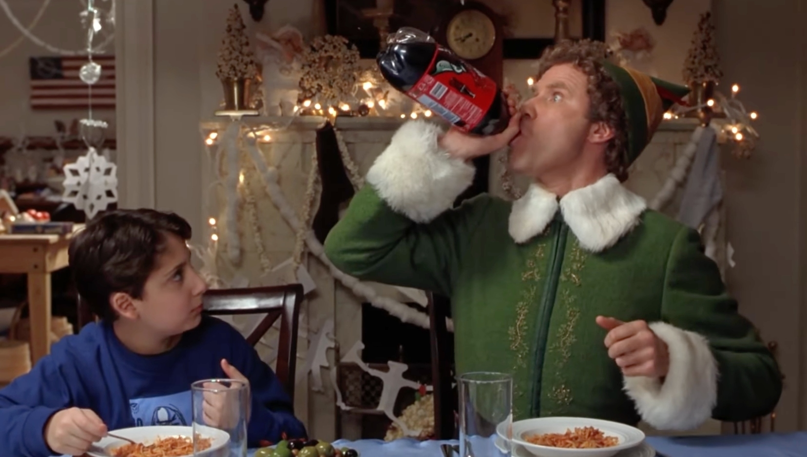 Buddy the Elf chugging Coca-Cola