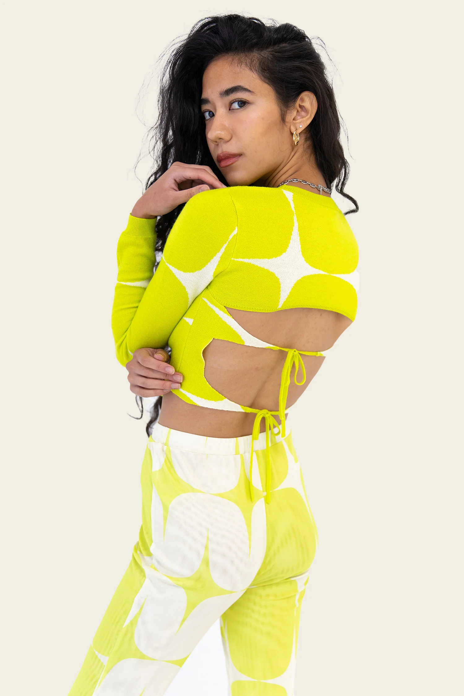 yellow long sleeve with star shapes and backless tie back