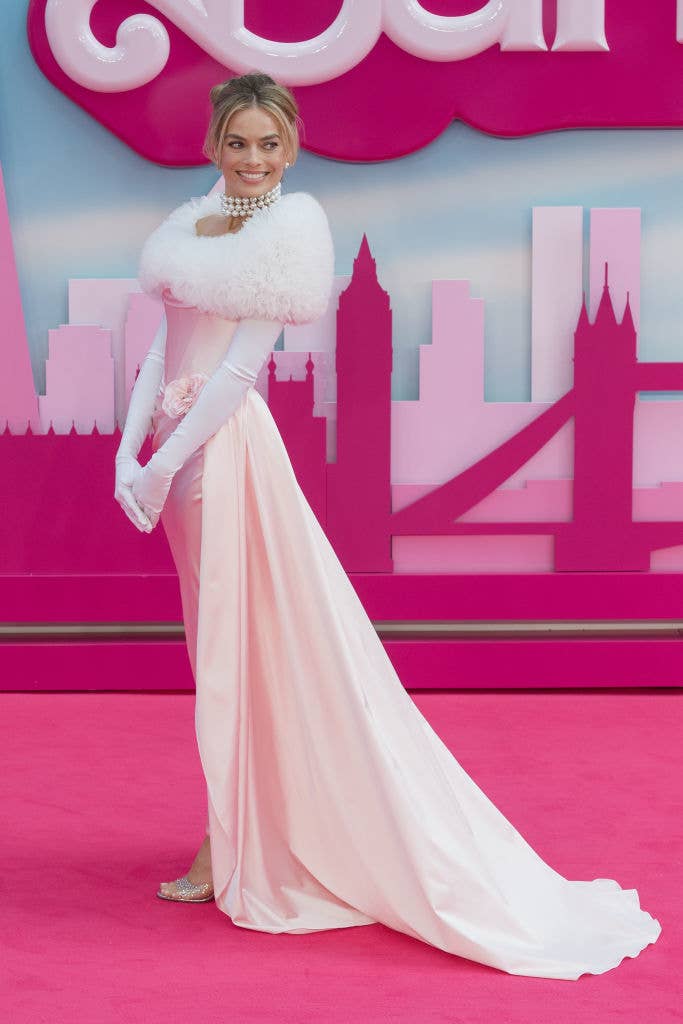 margot on the pink carpet at the movie premiere