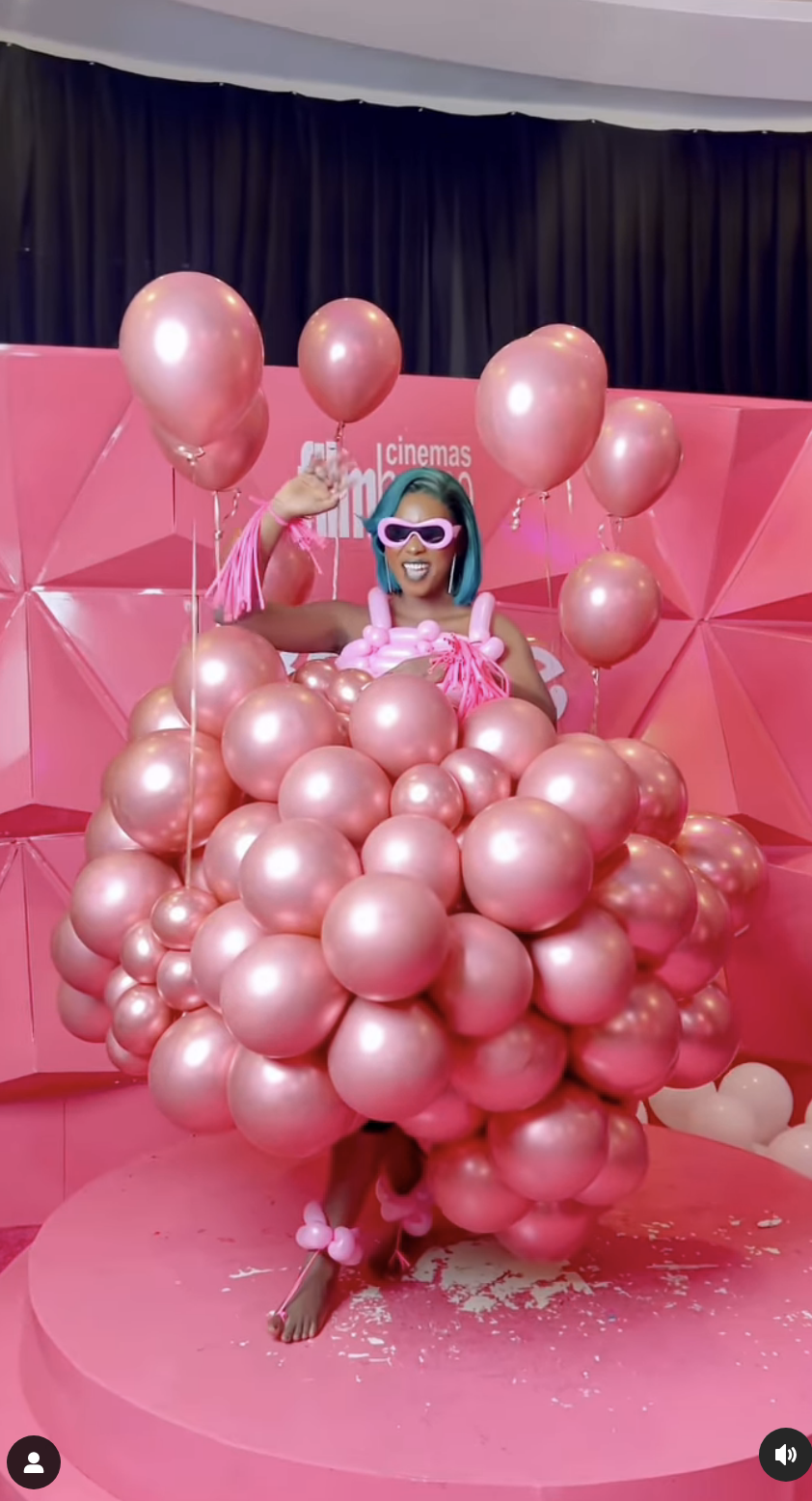 wearing a dress made of balloons