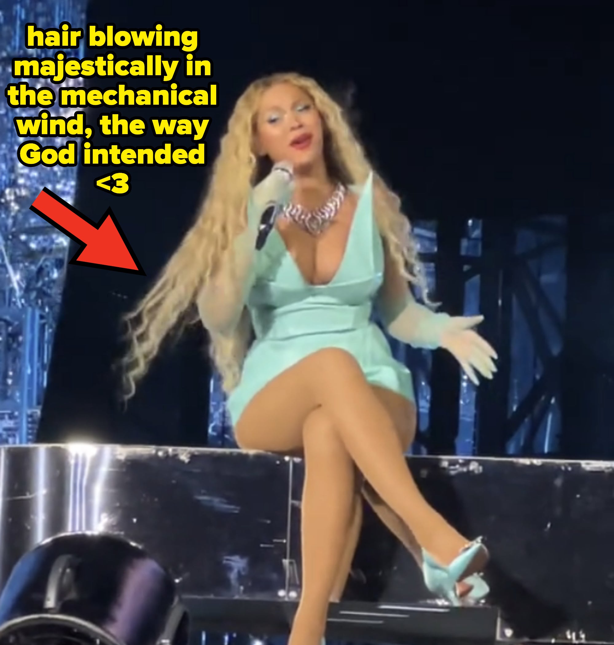 Beyoncé performing on stage with caption &quot;hair blowing majestically in the mechanical wind, the way God intended&quot;