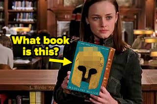 Rory Gilmore holding a book.