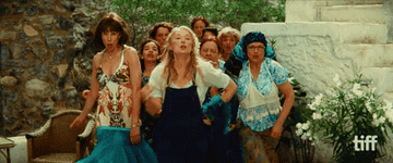 The cast of the 2008 Mamma Mia film strutting in their outfits