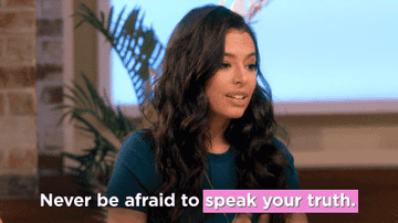 A woman saying &quot;never be afraid to speak your truth&quot;