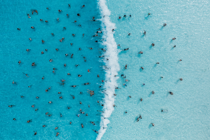 People in a wave pool