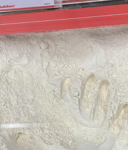 A hand print in some flour