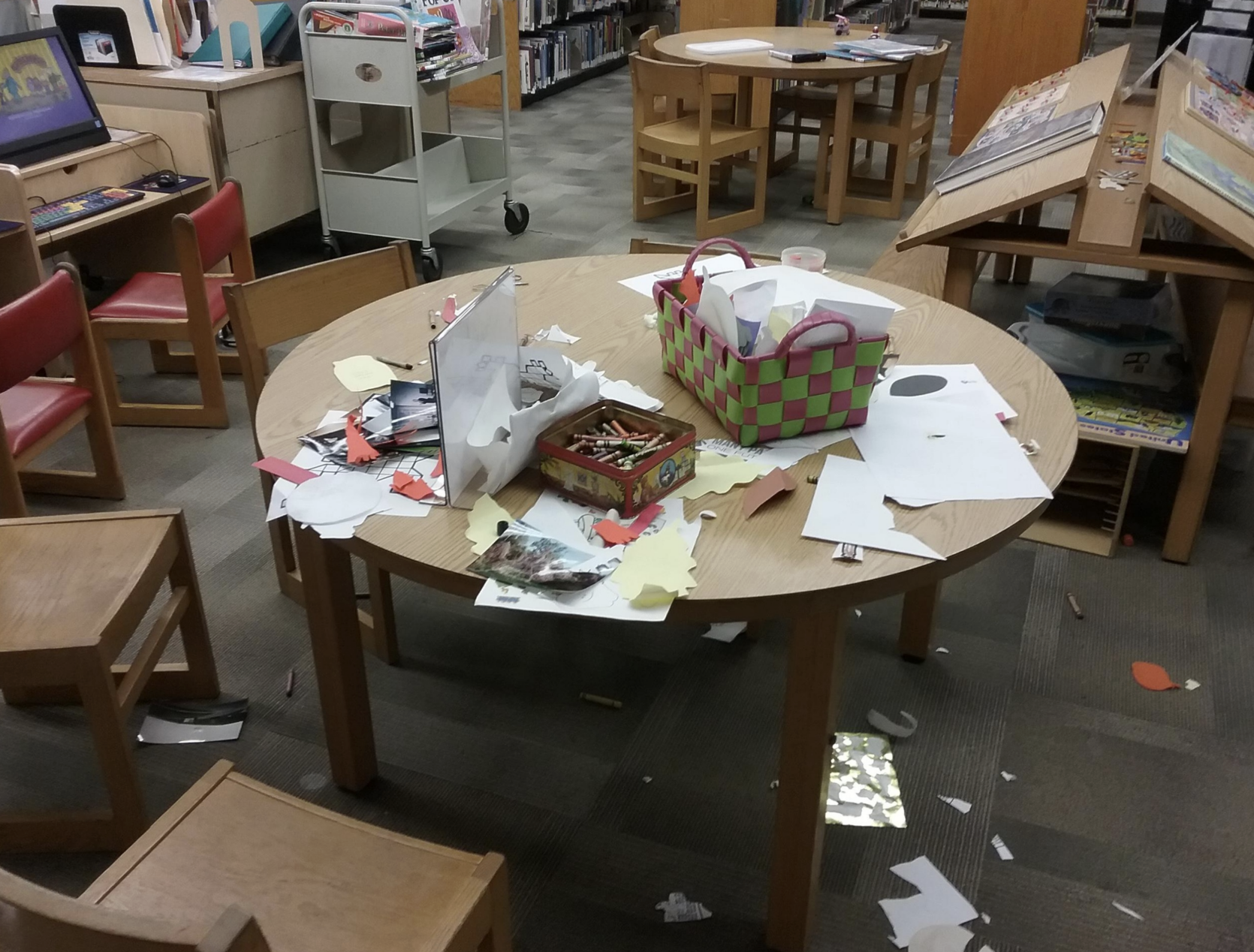 A messy table in a library