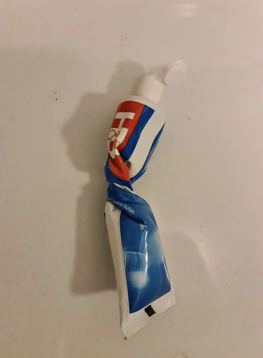 A twisted toothpaste tube