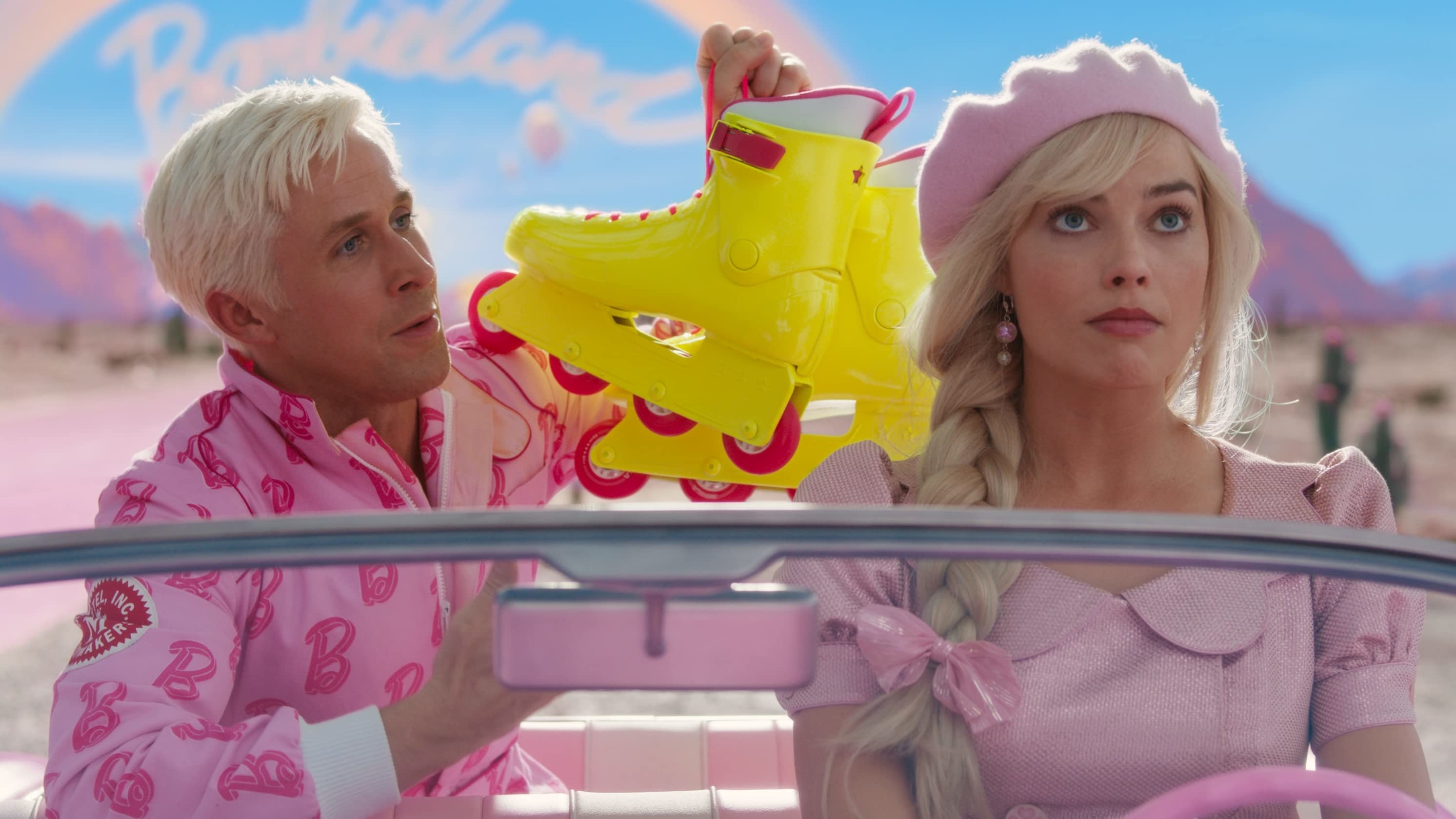 Barbie driving with Ken in the backseat holding up a pair of rollerblades