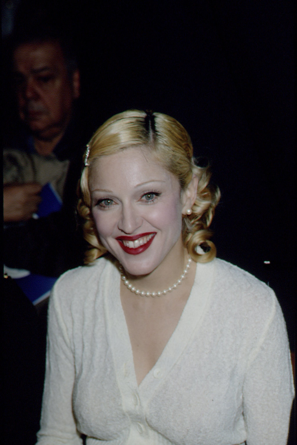 A closeup of Madonna smiling