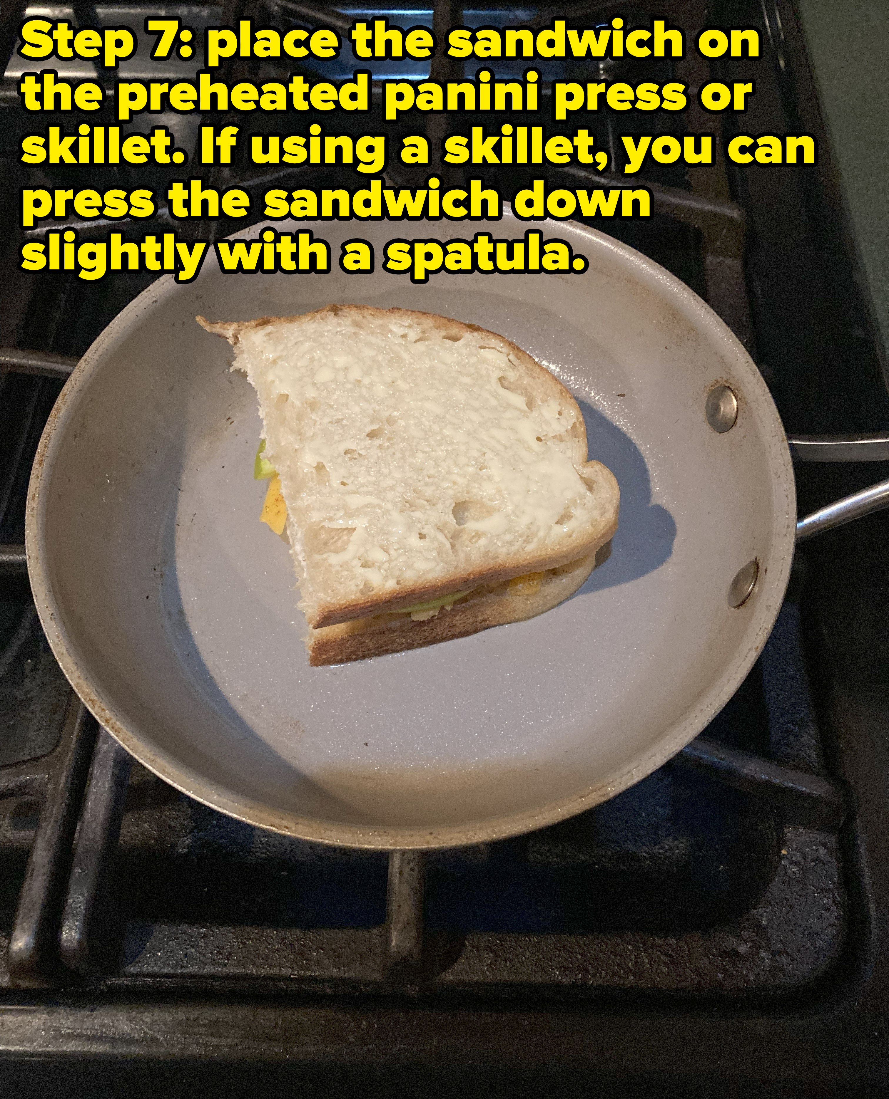 photo of step 7 with the the words &quot;place the sandwich on the preheated panini press or skillet, if using a skillet, use can press the sandwich down slightly with a spatula&quot;