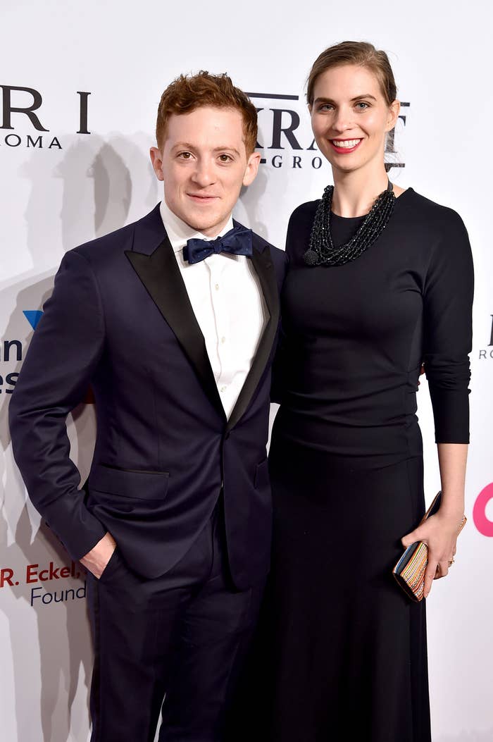 Closeup of Ethan Slater and Lilly Jay wearing formal wear on the red carpet at a media event