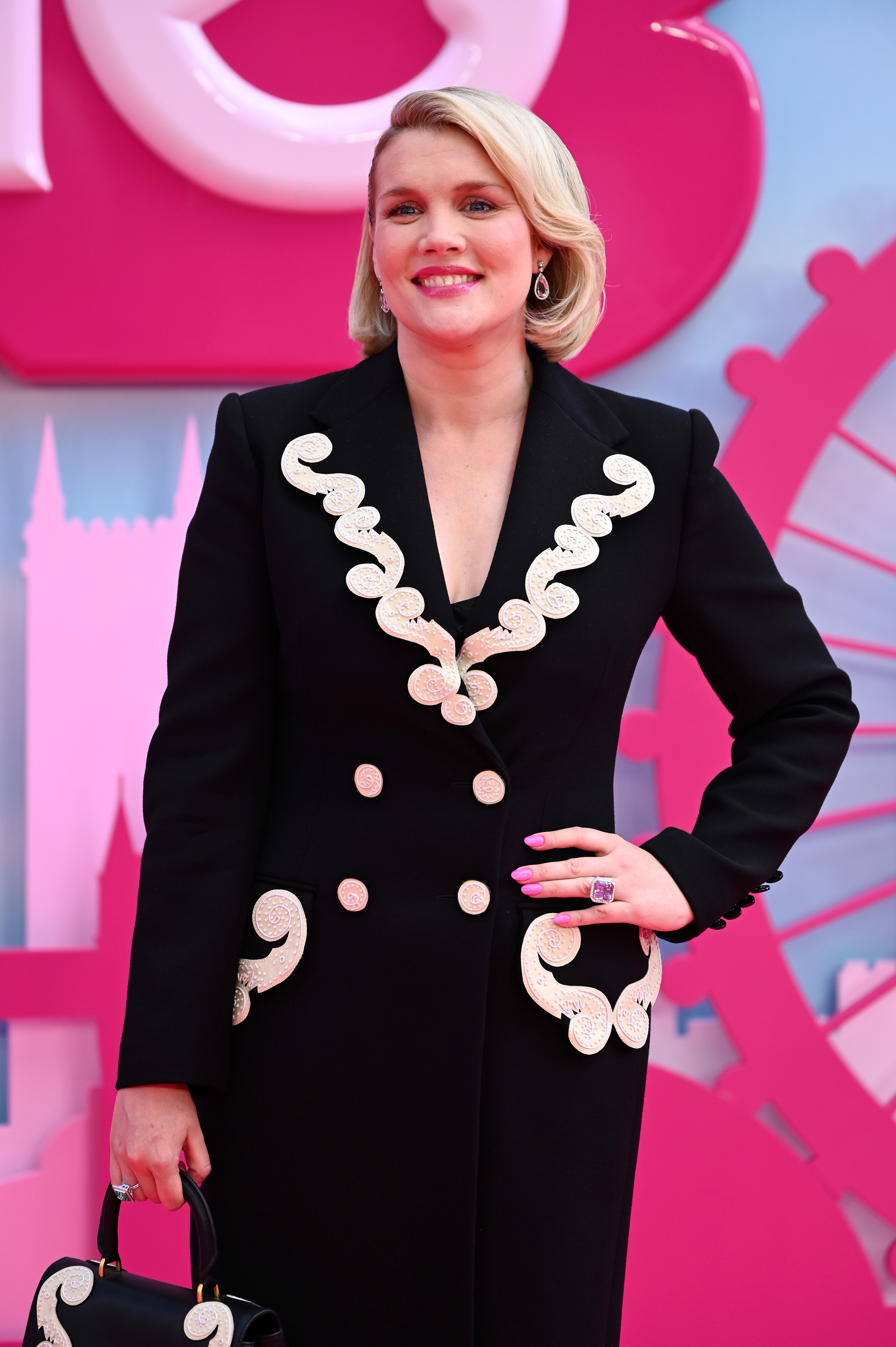 Closeup of Emerald Fennell on the pink carpet of the Barbie premiere
