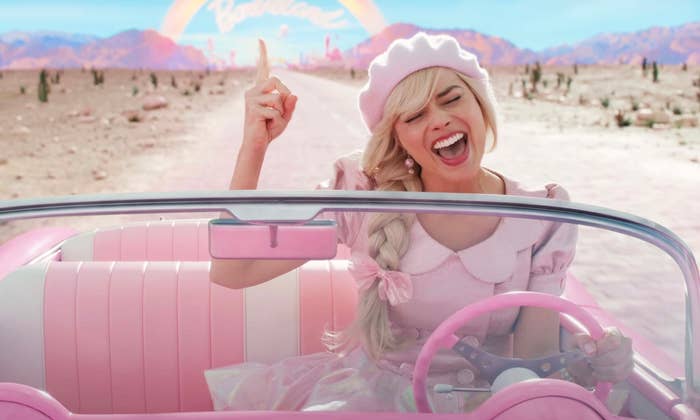 Barbie singing as she drives her convertible