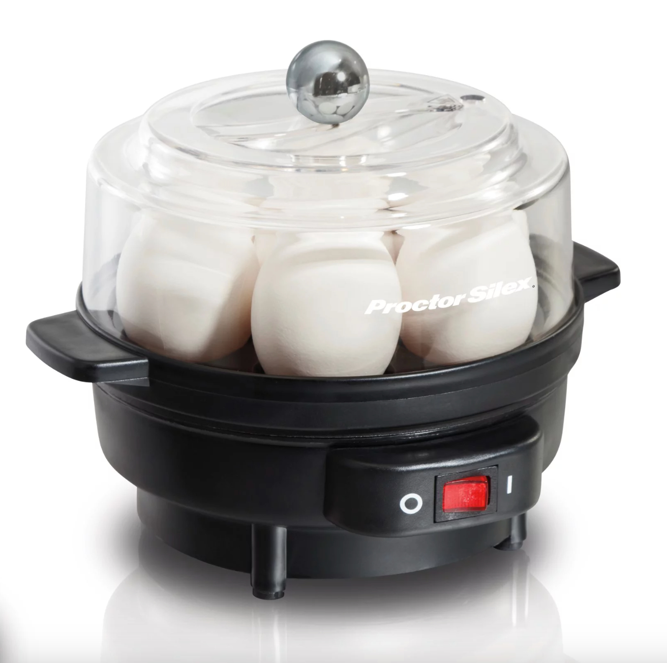 the black egg cooker being used to cook several eggs in their shells