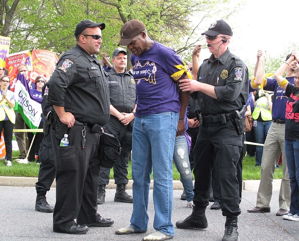 Danny Glover being arrested