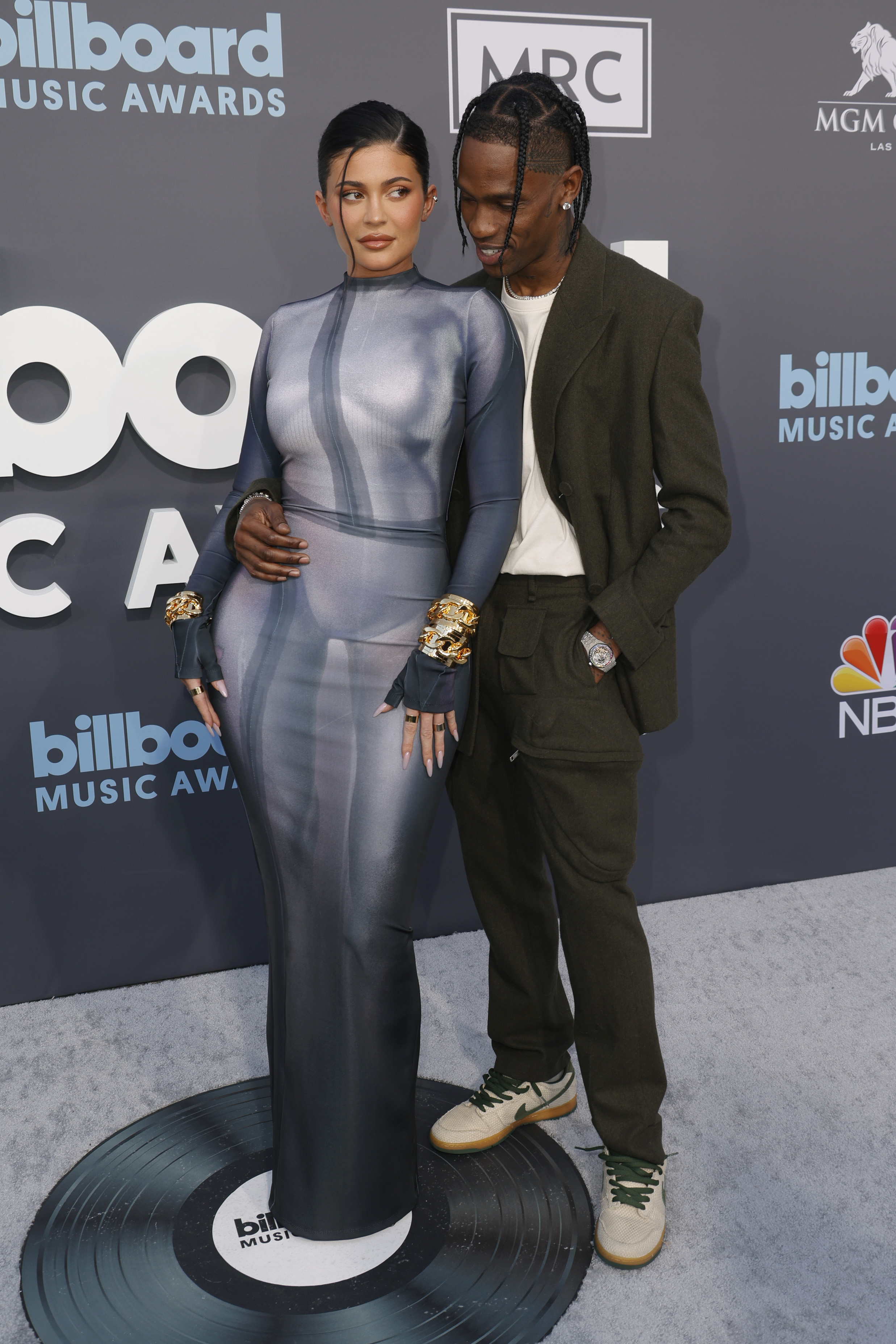 Kylie and Travis pose together on the red carpet for photographers at the Billboard Music Awards