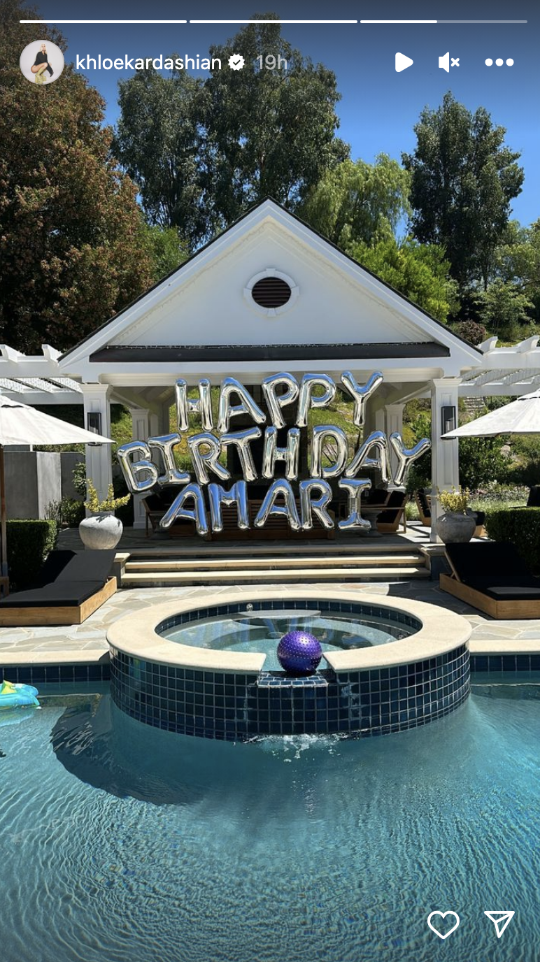 Screenshot of balloons spelling out &quot;Happy birthday Amari&quot; outside by a pool