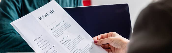 Manager holding a resume