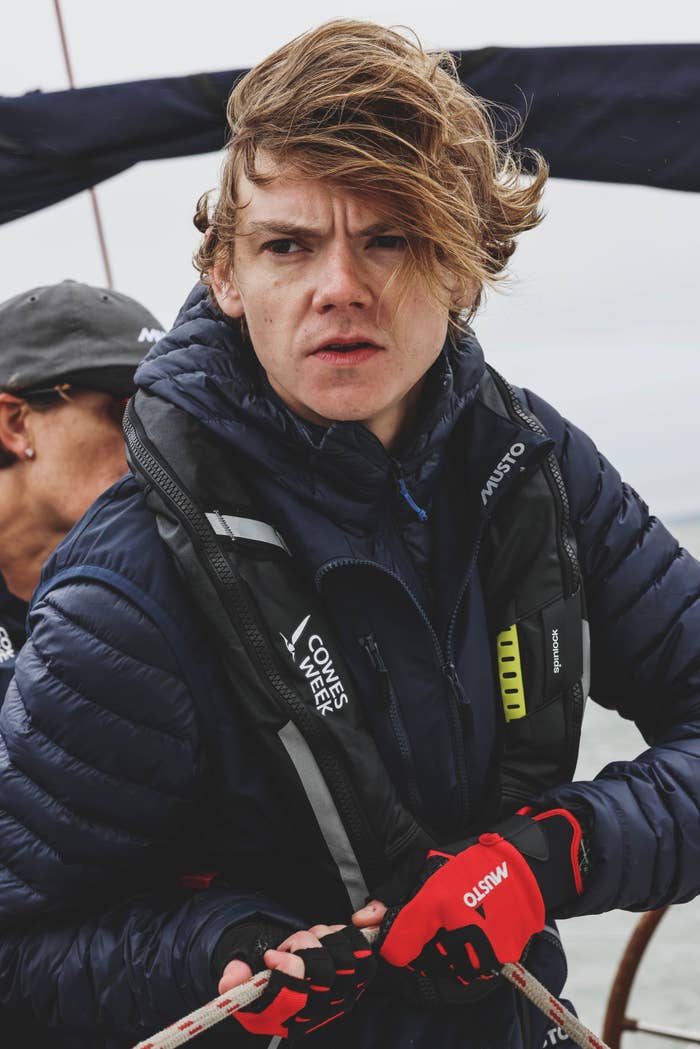 An adult Thomas Brodie-Sangster sailing