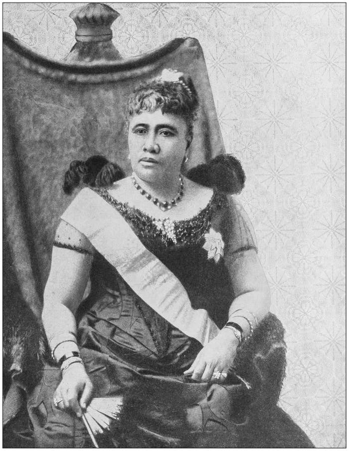 portrait of the queen wearing a sash