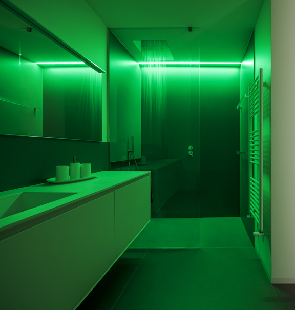 bathroom with a green light glowing