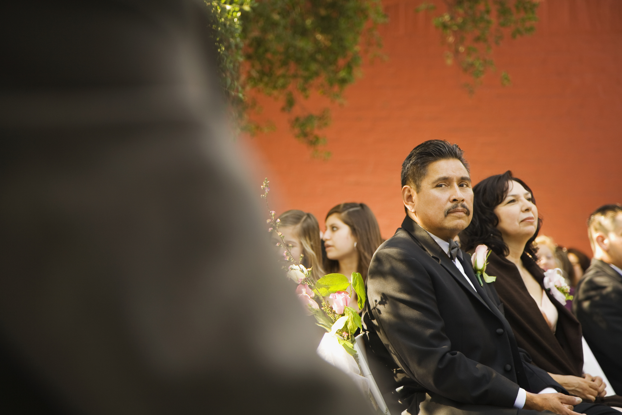 People sitting during a wedding ceremony