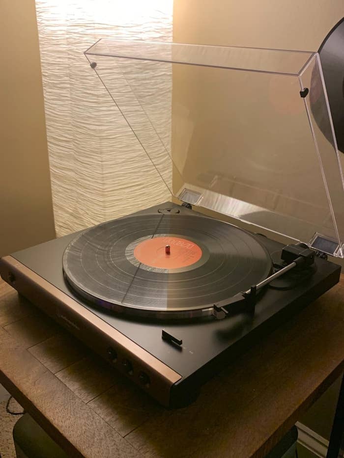 reviewer&#x27;s record player with clear lid