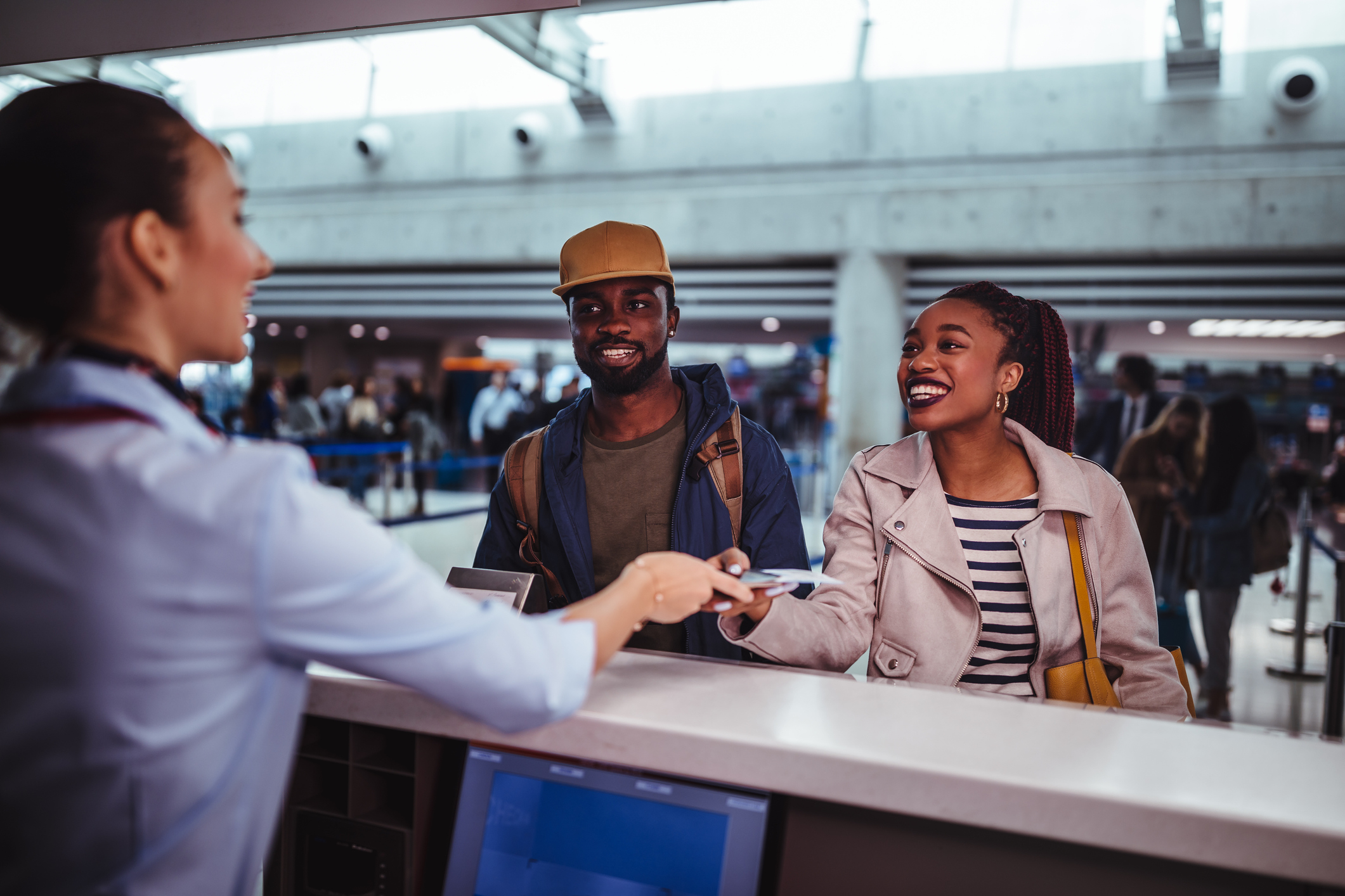 people showing their ticket at the gate