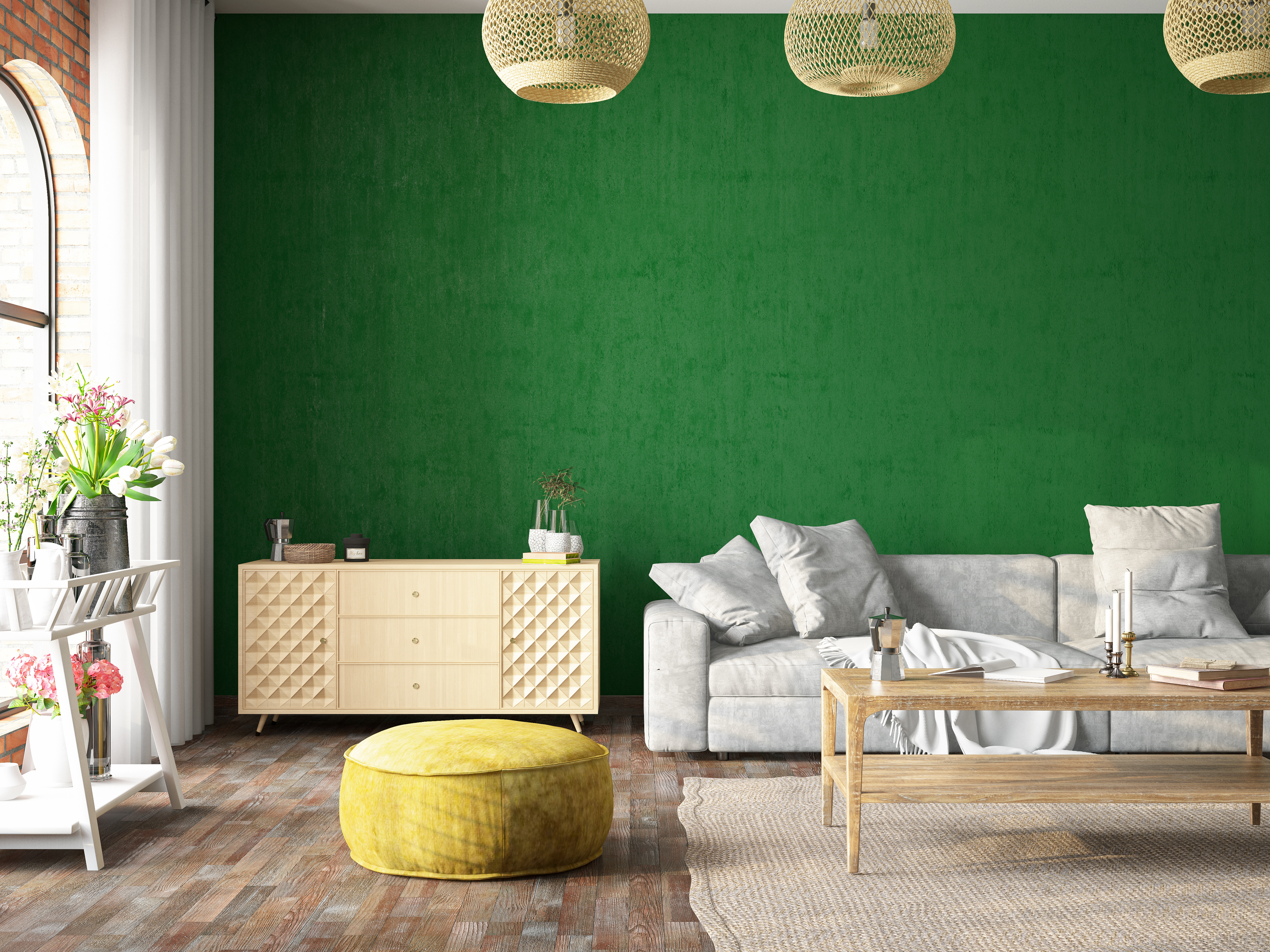 Green wall with neutral furniture and a velvet rounded seat