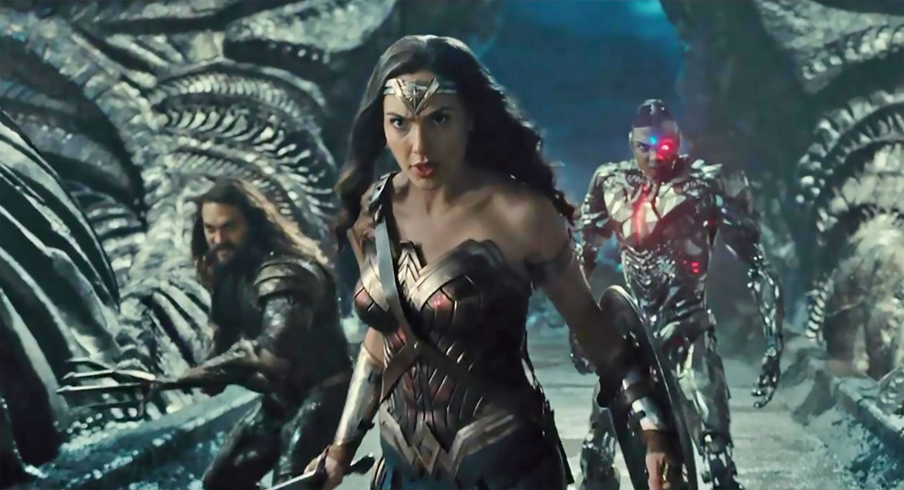 Jason Momoa, Gal Gadot and Ray FIsher ready themselves for combat on an alien vessel