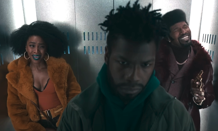 closeup of the three in an elevator in the film