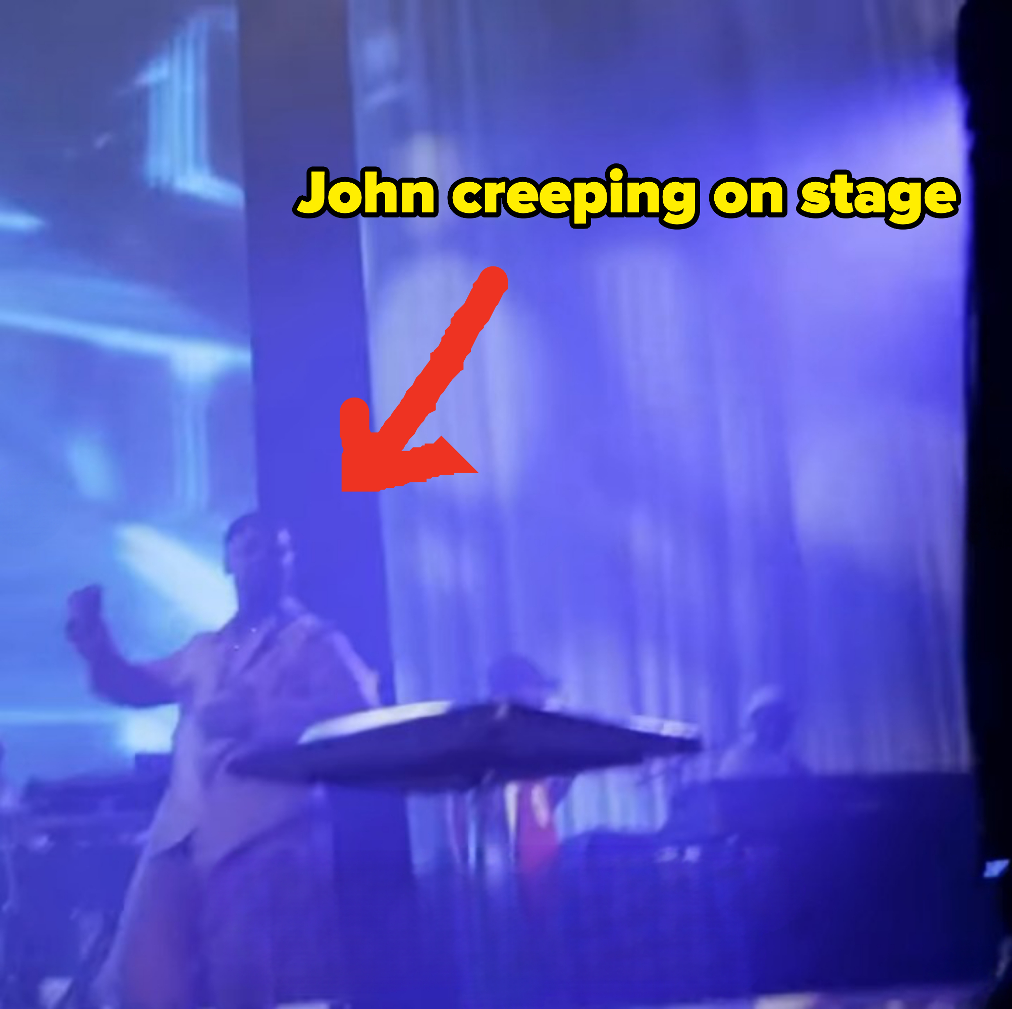 john walking onto the stage