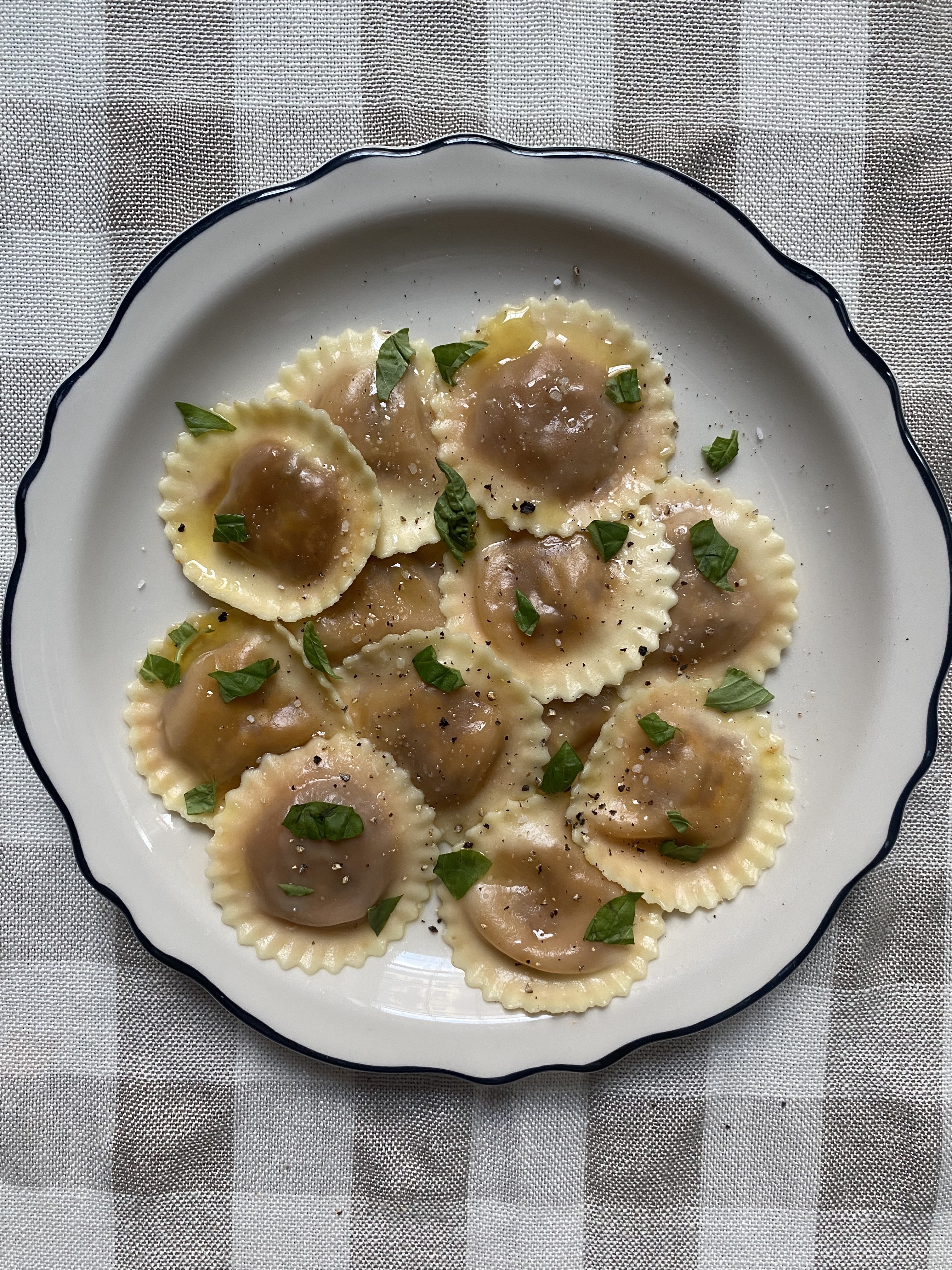 Plated vegan italian bolognese ravioli