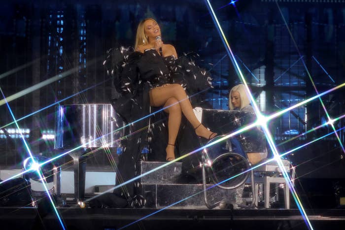 Beyonce sitting on stage