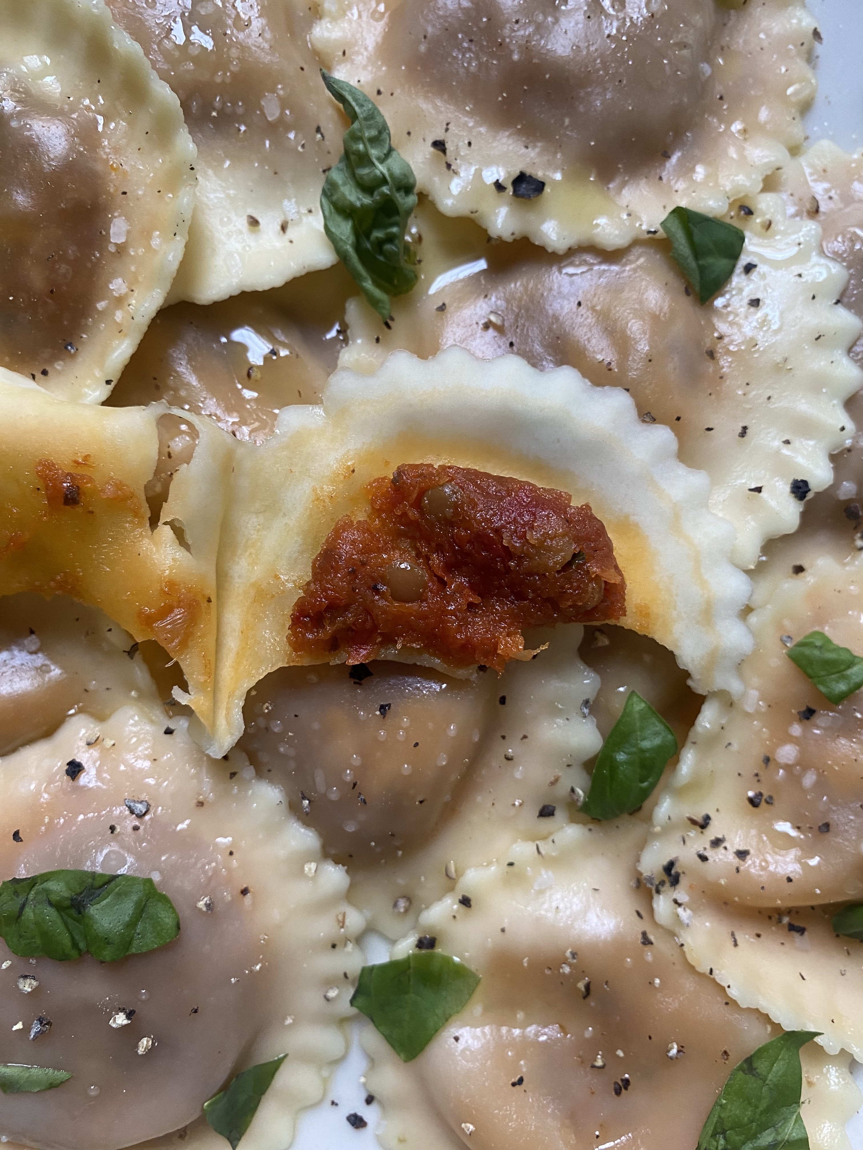 The inside of a vegan Italian bolognese ravioli