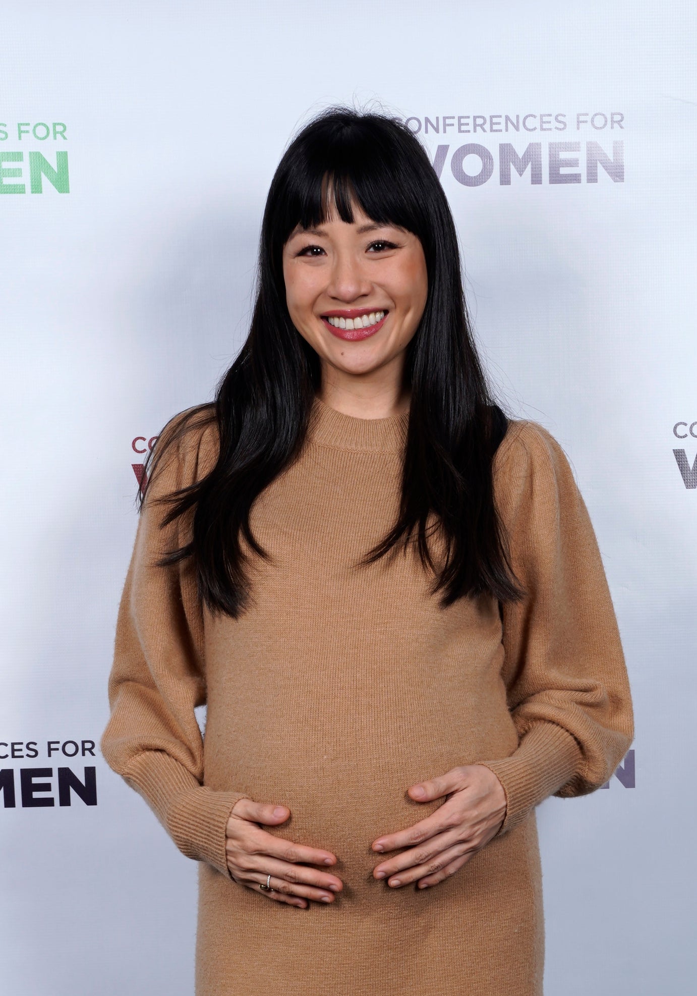 Constance Wu is shown with her baby bump