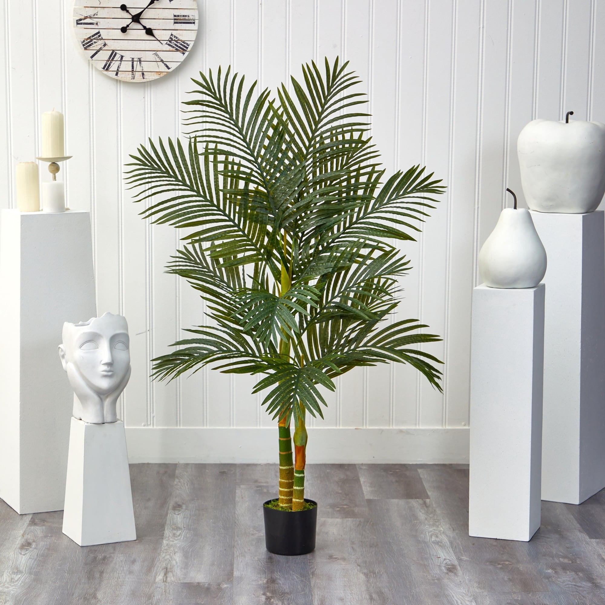 the artificial palm tree in a pot