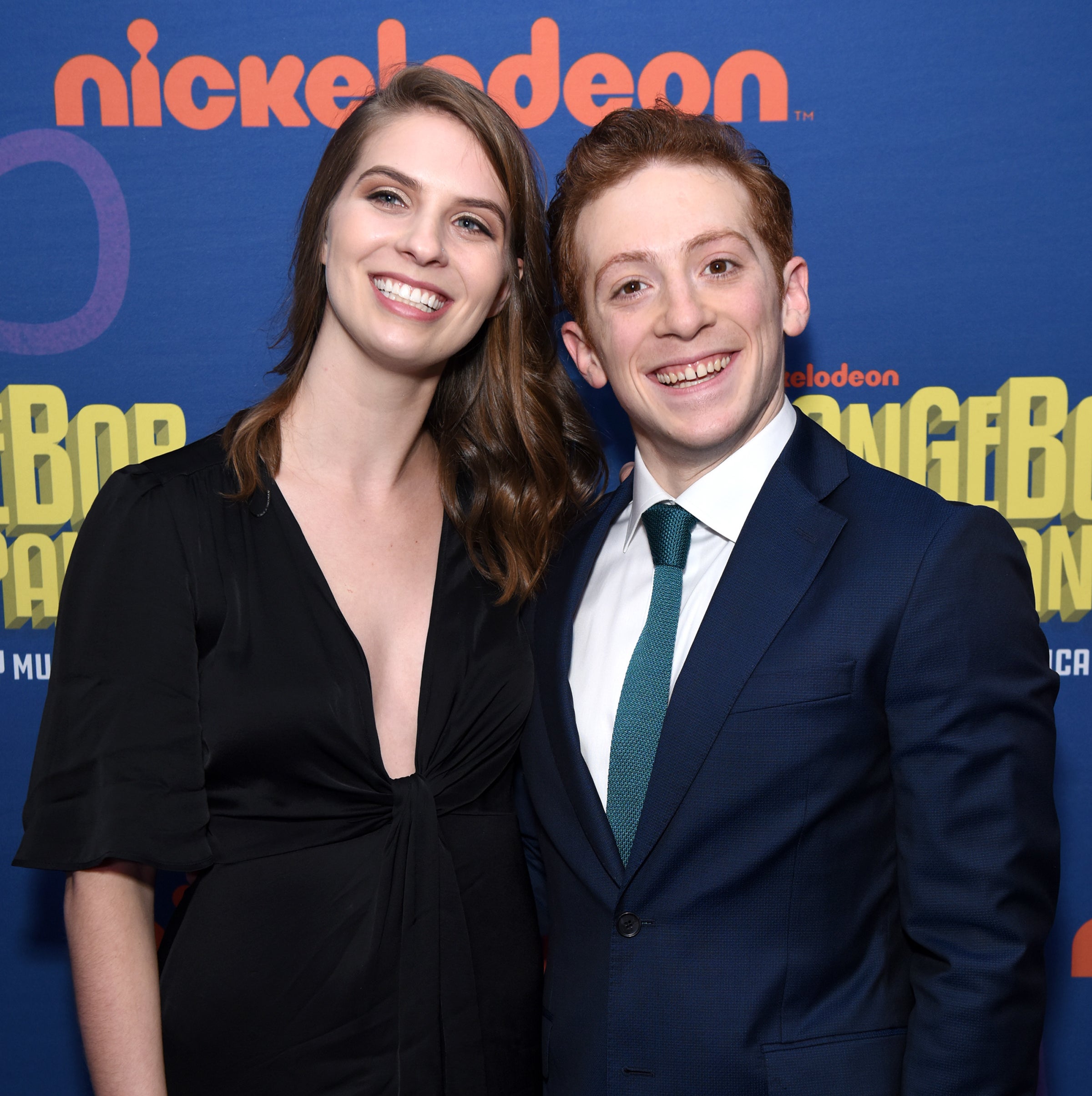 Lilly and Nathan smiling at a public event