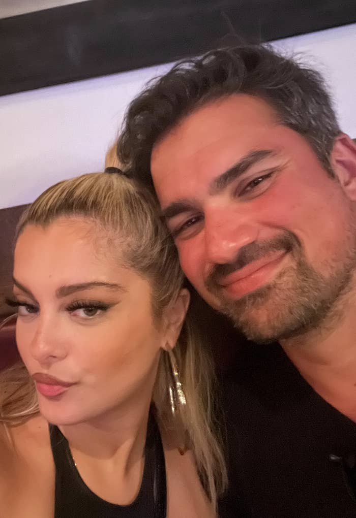 Bebe Rexha and Keyan Safyari lean toward each other for a picture