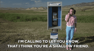 A teenage girl on a payphone saying &quot;I&#x27;m calling to let you know, that I think you&#x27;re a shallow friend&quot;