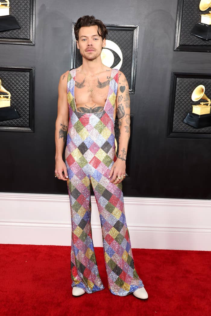 Harry Styles in a multicolored sparkly jumpsuit on the Grammys red carpet