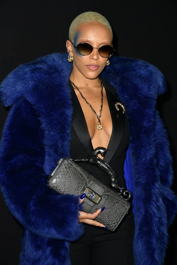 Close-up of Doja at a media event in a furry coat