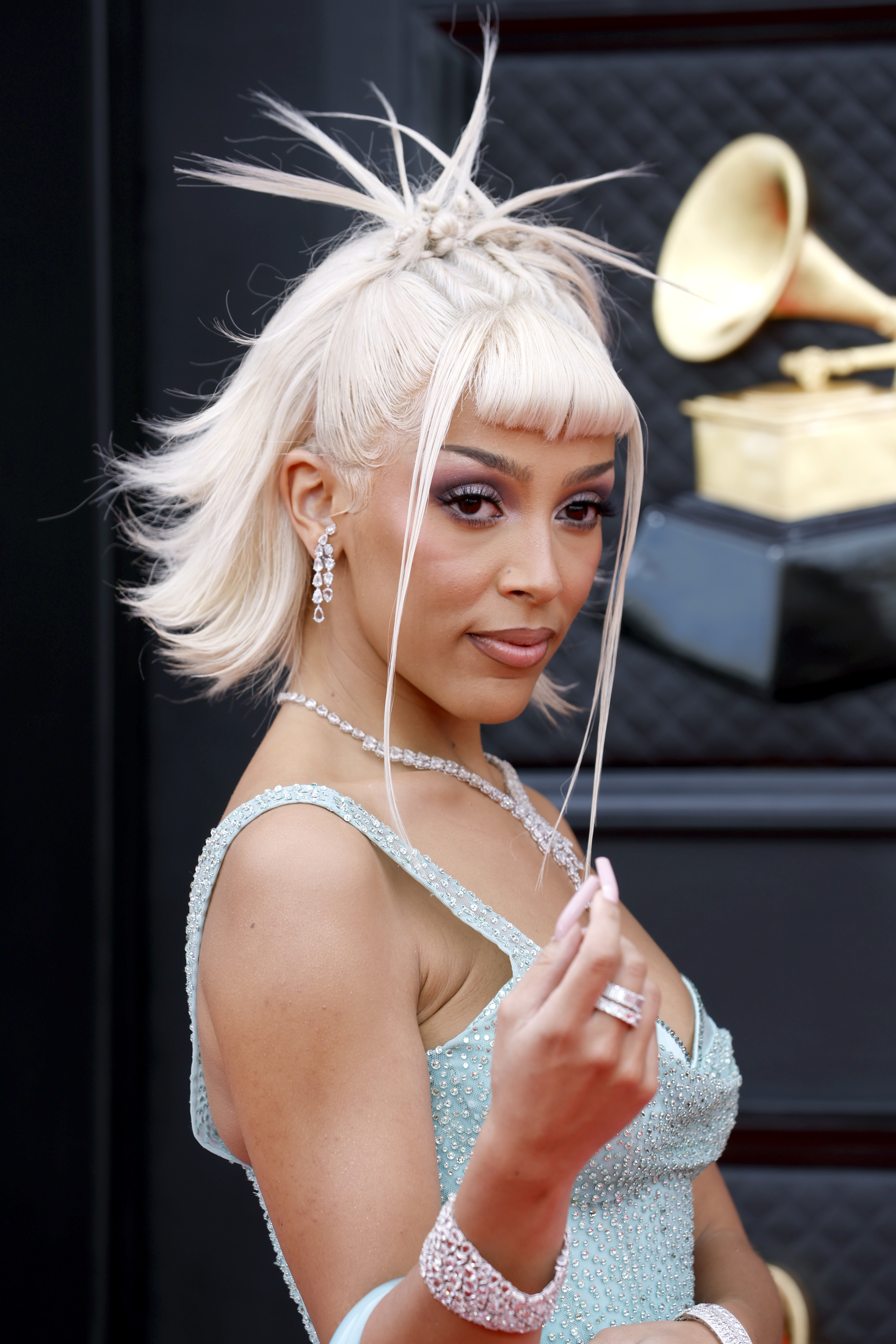 Close-up of Doja at the Grammys in a bejeweled spaghetti-strap outfit